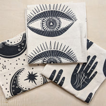 Load image into Gallery viewer, 3 zero waste universal cloths.  Black ink on unbleached cotton, left to right: crescent moons, eyes, hands.  Witch made by The Rainbow Vision available at Coyote Supply Co, a zero waste witch store in Midtown Reno, Nevada that is BIPOC owned