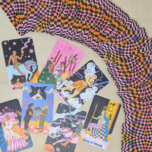 Arch of tarot cards from upper left corner to lower right corner of the image. Backs of the cards feature warped rainbow checkerboard patterns on them. Seven cards are laid face up in the lower left corner.