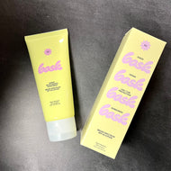 Bask sunscreen lotion tube and box on a dark gray background. 

The Tube reads:
A yellow tube of sunscreen that reads Bask, sheer, moisturizing sunscreen, broad spectrum SPF 50 lotion, water & sweat resistant.

The box reads:
Bask, sheer, vegan, uva/uvb protection sunscreen broad spectrum SPF 50 lotion. 

Sold at Coyote Supply Co a BIPOC and LGBTQIA+ owned zero waste witch store in Reno Nevada