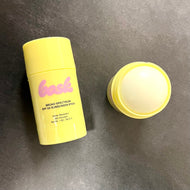 A yellow tube that reads:
Bask
broad spectrum SPF 50 
sunscreen stick
water resistant
(80 minutes
Net Wt. 1oz/28.35 G
Pictured on a dark background
Sold at Coyote Supply Co a BIPOC and LGBTQIA+ owned zero waste witch store in Reno Nevada
