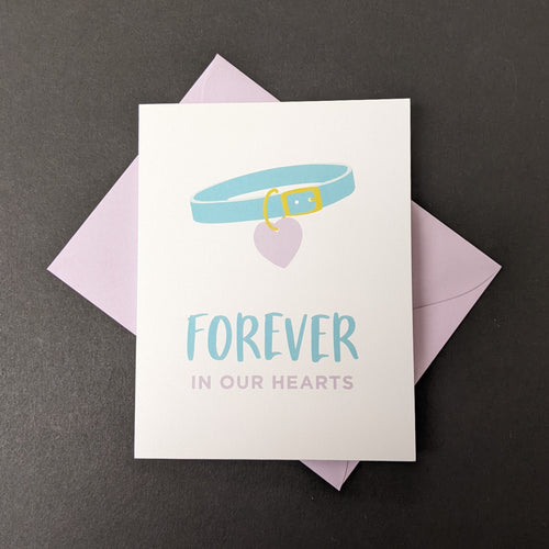 A white card with an illustration of a pet collar that reads Forever in our Hearts. Sold at Coyote Supply Co a BIPOC and LGBTQIA+ owned zero waste witch store in Reno Nevada 