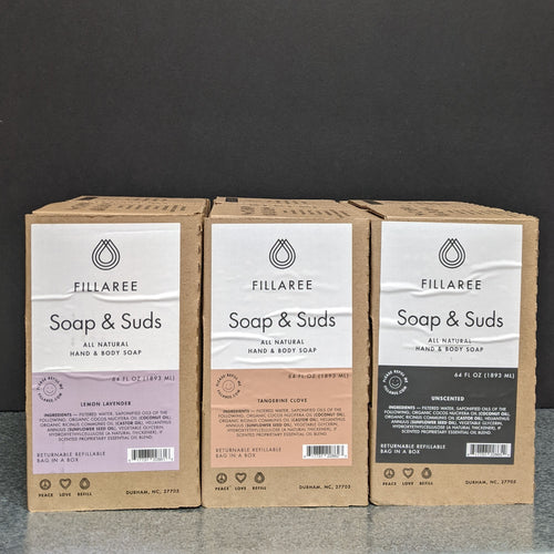 Three boxes of Fillaree Soap & Suds all natural Hand & Body soap. From left to right the scents are Lemon Lavender, Tangerine Clove, and Unscented. Sold at Coyote Supply Co a BIPOC and LGBTQIA+ owned zero waste witch store in Reno Nevada