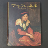 A hardcover book with a painting of Pamela Colman Smith
The cover reads in gold lettering:
Pamela Colman Smith
THE UNTOLD STORY
By Stuart R. Kaplan
With 
Mary K. Greer . Elizabeth Foley O'Connor . Melinda Boyd Parsons

Sold at Coyote Supply Co a BIPOC and LGBTQIA+ owned zero waste witch store in Reno Nevada