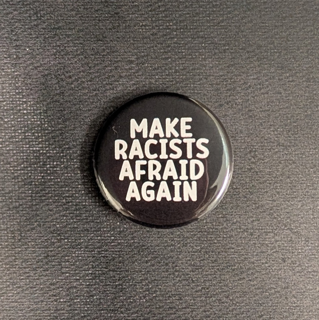 A black button with white text that reads 