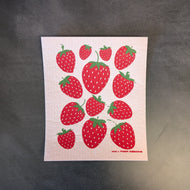 A light pink square dish cloth with a strawberry graphic pictured on a dark background.

This item is sold at Coyote Supply Co a BIPOC and LGBTQIA+ owned zero waste witch store in Reno Nevada