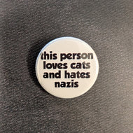 White button with black text that reads 