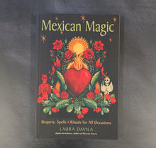 Load image into Gallery viewer, Black book cover that reads 'Mexican Magic' by Laura Davila, colorful illustrations on a black background.
Sold at Coyote Supply Co a BIPOC and LGBTQIA+ owned zero waste witch store in Reno Nevada