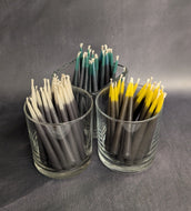 Three glass containers of hex breaker chime candles. From left to right the colors are white tipped black, green tipped black, and yellow tipped black.

This item is sold at Coyote Supply Co a BIPOC and LGBTQIA+ owned zero waste witch store in Reno Nevada