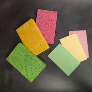 3 flat colorful rectangular sponges and 3 fully puffed colorful rectangular sponges on a black background. The sponges come in 3 colors pink, yellow, and green.

This item is sold at Coyote Supply Co a BIPOC and LGBTQIA+ owned zero waste witch store in Reno Nevada