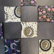 An assortment of reusable cotton squares with colorful varying patterns pictured on a dark background

This item is sold at Coyote Supply Co a BIPOC and LGBTQIA+ owned zero waste witch store in Reno Nevada