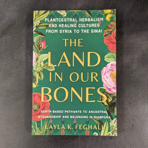 A green book cover adorned with images of flowers and plants that reads Plantcestral Herbalism and Healing Cultues from Syria to the Sinai The Land In Our Bones Earth-Based Pathways to Ancestral Stewardship and Belonging in Diaspora. Sold at Coyote Supply Co a BIPOC and LGBTQIA+ owned zero waste witch store in Reno Nevada