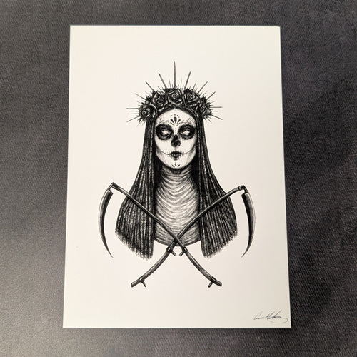 Black drawing on white paper of Santa Murete from the chest up. She has a crown of roses and two scythes crossed in front of her. Sold at Coyote Supply Co a BIPOC and LGBTQIA+ owned zero waste witch store in Reno Nevada