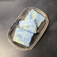 Three blue and green soap bars in a silver plate on a black background. The soap bars are stamped with the brand name Soap Distillery.

This item is sold at Coyote Supply Co a BIPOC and LGBTQIA+ owned zero waste witch store in Reno Nevada