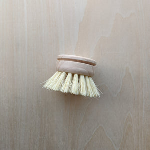 Round wooden brush with agave bristles available at Coyote Supply Co, a zero waste witch store in Midtown Reno, Nevada that is BIPOC owned