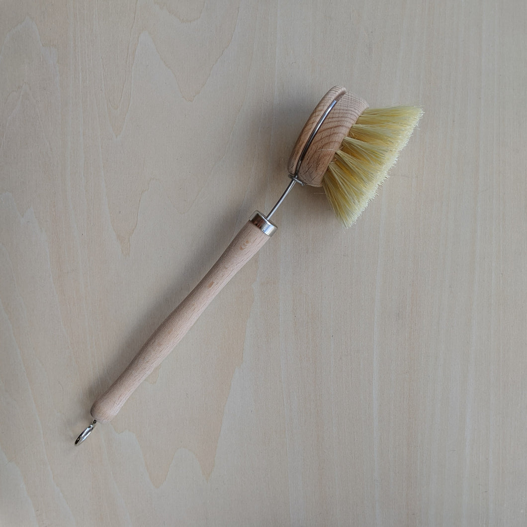 Wooden handled dish brush with agave bristles and metal details available at Coyote Supply Co, a zero waste witch store in Midtown Reno, Nevada that is BIPOC owned