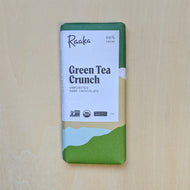 Green & white paper wrapped chocolate bar  by Raaka available at Coyote Supply Co, a zero waste witch store in Midtown Reno, Nevada that is BIPOC owned