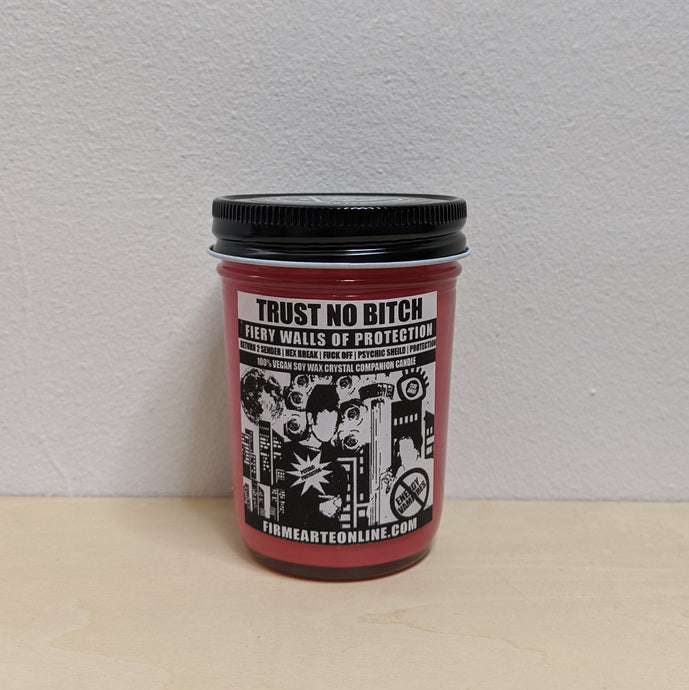 Red soy wax candle in glass jar with a black and white label by Firme Arte available at Coyote Supply Co, a zero waste witch store in Midtown Reno, Nevada that is BIPOC owned