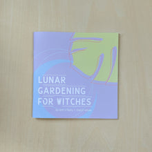 Load image into Gallery viewer, Purple zine by Plant Magic with a blue crescent moon in the bottom left corner &amp; a green split leaf monstera leaf in the top right corner reads &quot;Lunar Gardening for Witches&quot; available at Coyote Supply Co, a zero waste witch store in Midtown Reno, Nevada that is BIPOC owned