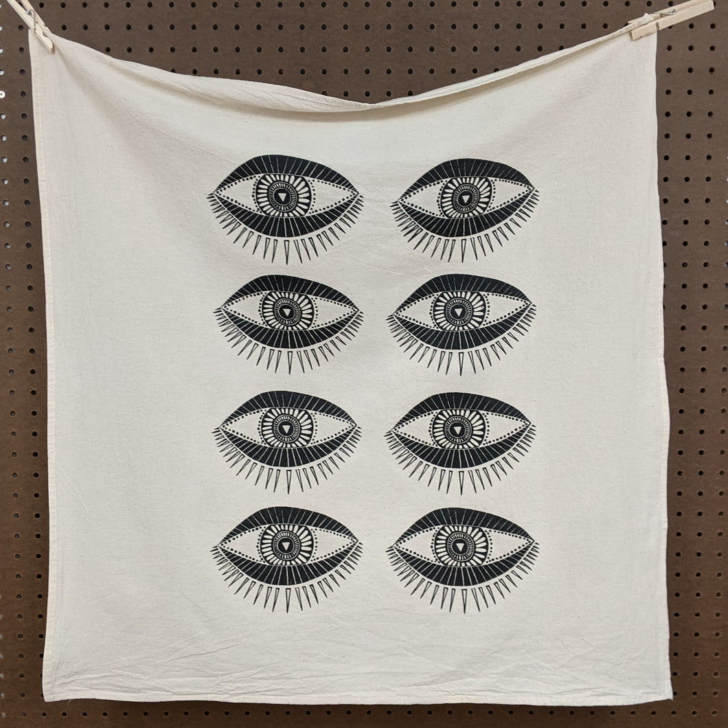 Zero waste universal cloth.   Unbleached cotton with black ink, two rows of 4 eyes.  Witch made by The Rainbow Vision available at Coyote Supply Co, a zero waste witch store in Midtown Reno, Nevada that is BIPOC owned