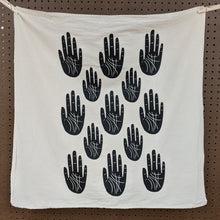Load image into Gallery viewer, Zero waste universal cloth.  Unbleached cotton with black ink, 5 rows of alternating sized hands.  Witch made by The Rainbow Vision available at Coyote Supply Co, a zero waste witch store in Midtown Reno, Nevada that is BIPOC owned