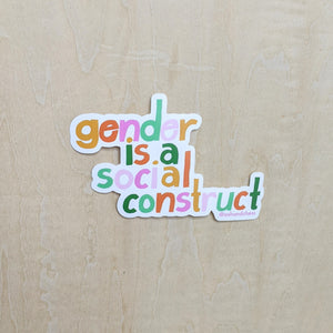 Multi-colored text reads "gender is a social construct" sticker by Ash & Chess, sold by zero waste witch store Coyote Supply Co in Reno, Nevada