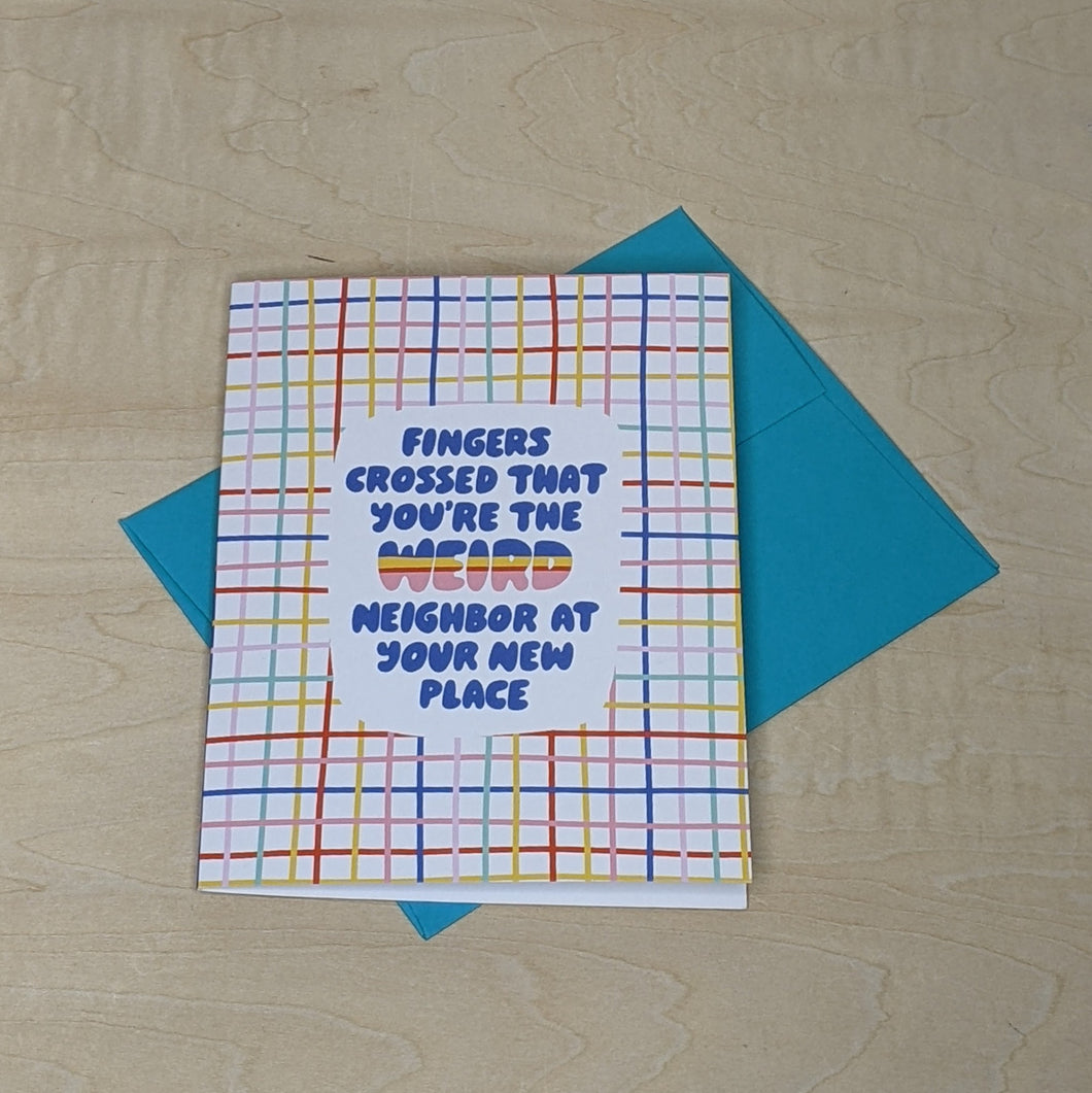 White plaid greeting card by Craft Boner laid on a blue envelope. Card reads 