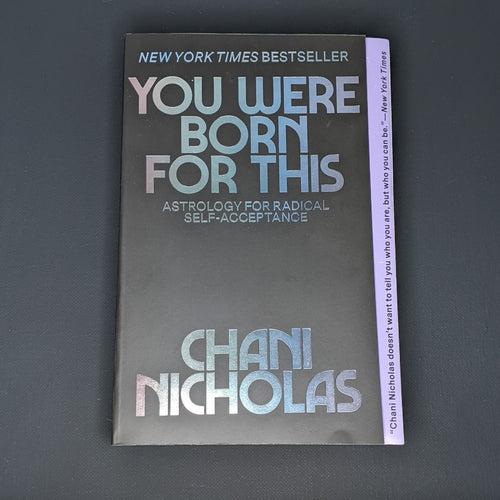 Black book by Chani Nicholas reads 