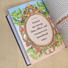 Load image into Gallery viewer, Page from Money Magic by Jessie Susannah Karnatz. Page features a blue to pink gradient background with a gold frame resting over green leaves. Inside of the frame reads &quot;I invest my energy, time, effort, and resources in intentional ways&quot; in black block lettering.