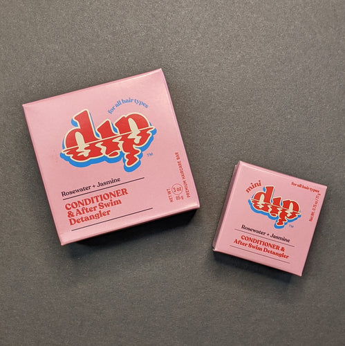 Dip Rosewater + Jasmine Conditioner in a pink box in regular 4oz and .75oz travel sizes. Sold at Coyote Supply Co a BIPOC and LGBTQIA+ owned zero waste witch store in Reno Nevada