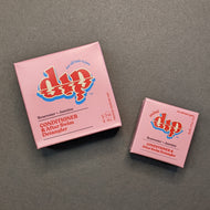 Dip Rosewater + Jasmine Conditioner in a pink box in regular 4oz and .75oz travel sizes. Sold at Coyote Supply Co a BIPOC and LGBTQIA+ owned zero waste witch store in Reno Nevada