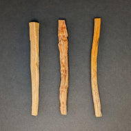 Three Tjarved sticks on a black background. 
Sold at Coyote Supply Co a BIPOC and LGBTQIA+ owned zero waste witch store in Reno Nevada