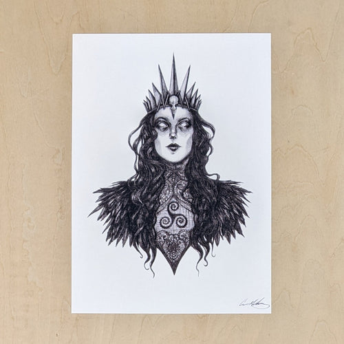 Black drawing on white paper of the Celtic Goddess The Morrigan, from the chest up.  Her hair is long & wavy & topped with a spiked crown adorned with a raven skull, she's wearing a high neck Irish lace blouse that looks Victorian & a raven feather cloak, & on the front of her chest is a triskelion. Available at Coyote Supply Co, a zero waste witch store in Midtown Reno, Nevada that is BIPOC owned