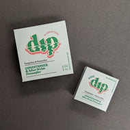 Dip Tangerine + Honeydew Conditioner in a baby blue box in regular 4oz and .75oz travel sizes. Sold at Coyote Supply Co a BIPOC and LGBTQIA+ owned zero waste witch store in Reno Nevada